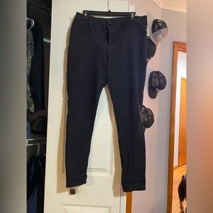 Black skinny jeans with two buttons